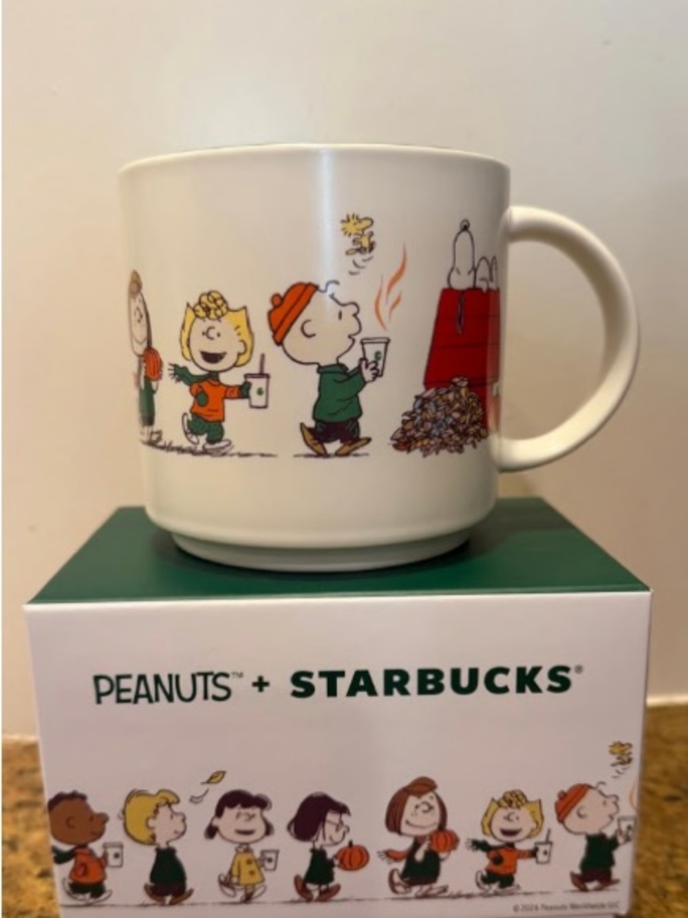 Starbucks White Ceramic Peanuts Parade Mug with Colorful Character Art
